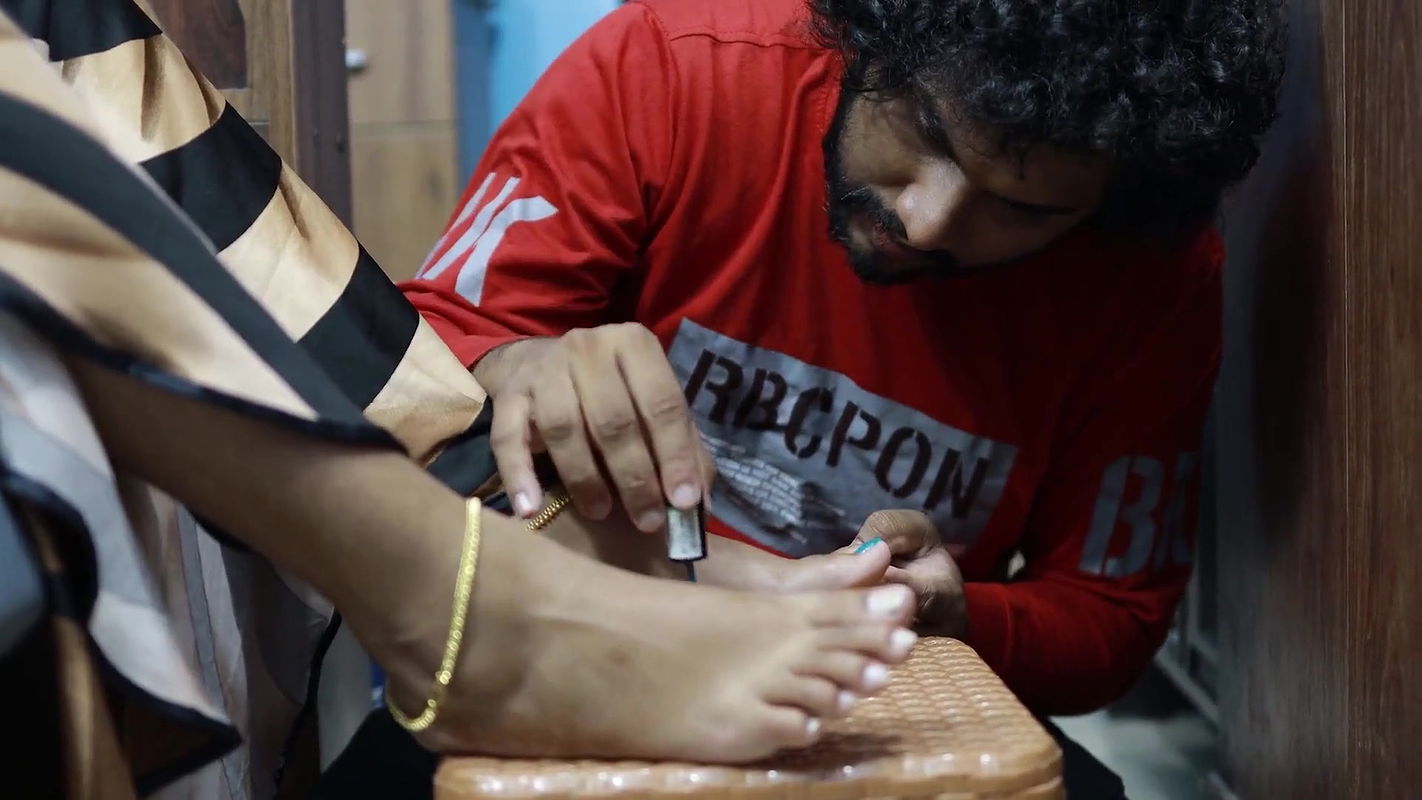 Boy Put Nail Polish on Girl Feet