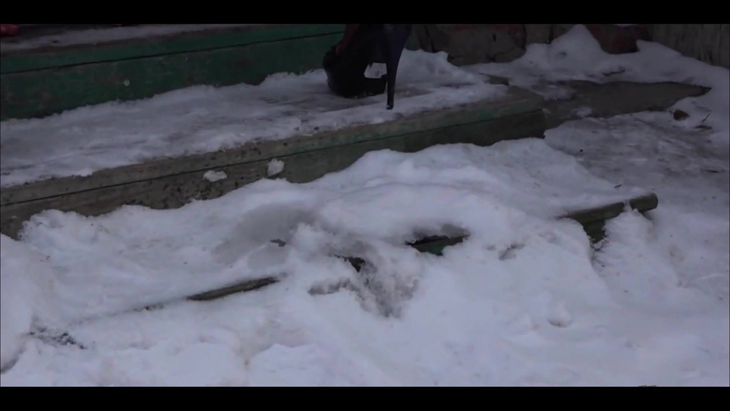 424252Natasha sing Standing on the Street back View