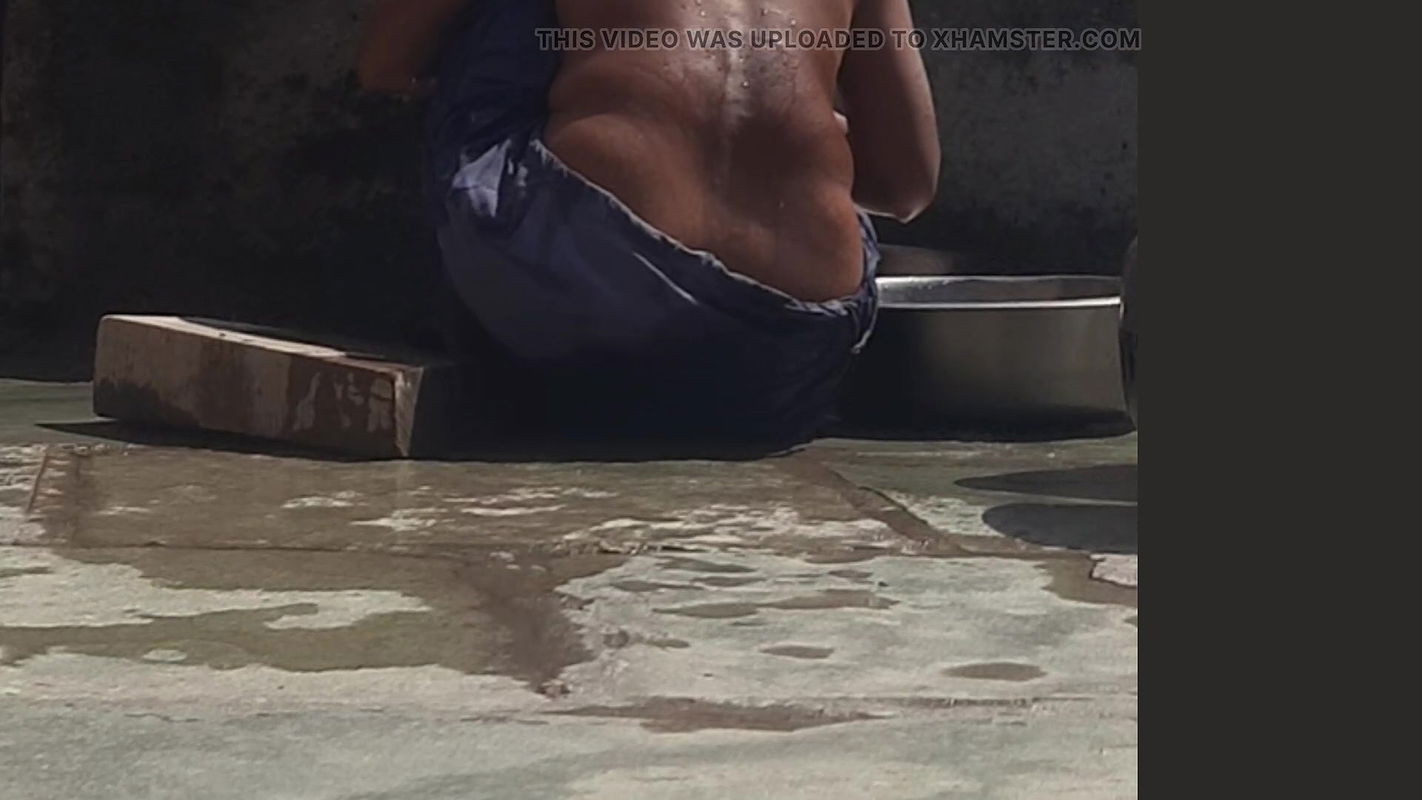 Desi sister-in-law is taking a bath in an open bathroom near the road on the edge of the forest on the farm