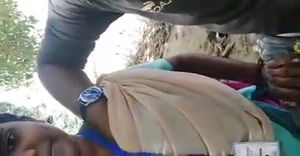 Giving outdoor blowjob to colleague