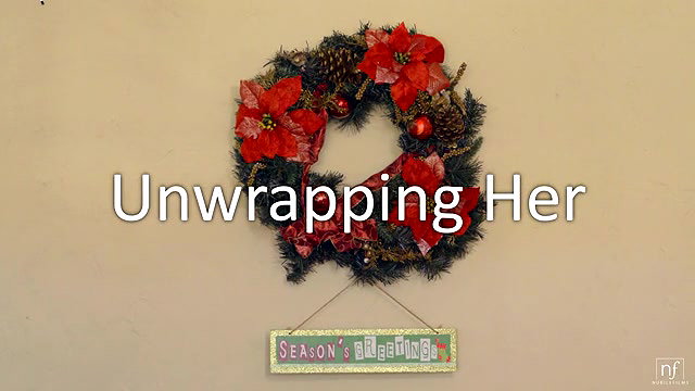 nubilefilms unwrapping her long