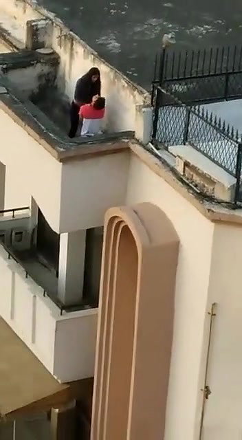 Young lover having on roof,captured