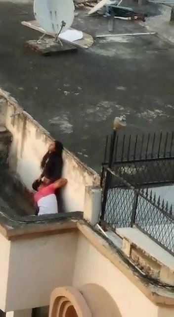 Young lover having on roof,captured