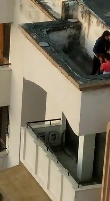 Young lover having on roof,captured
