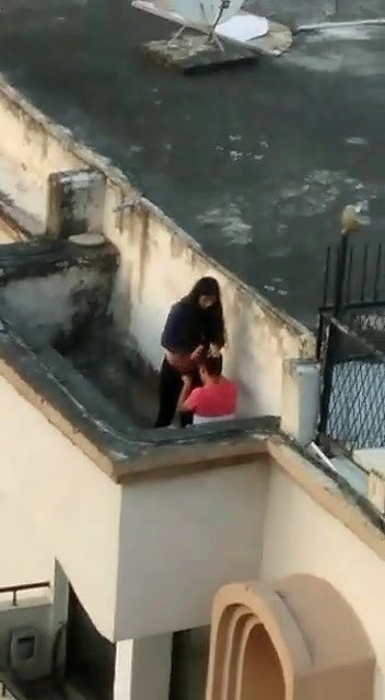 Young lover having on roof,captured