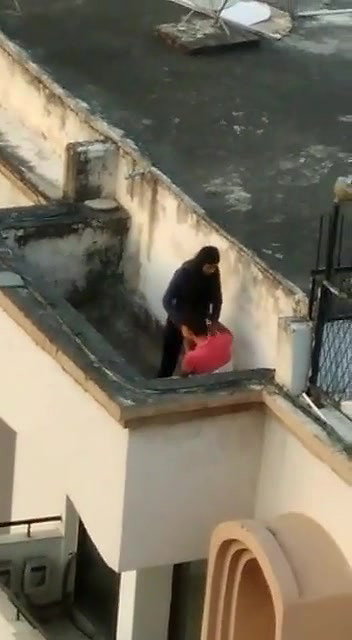 Young lover having on roof,captured