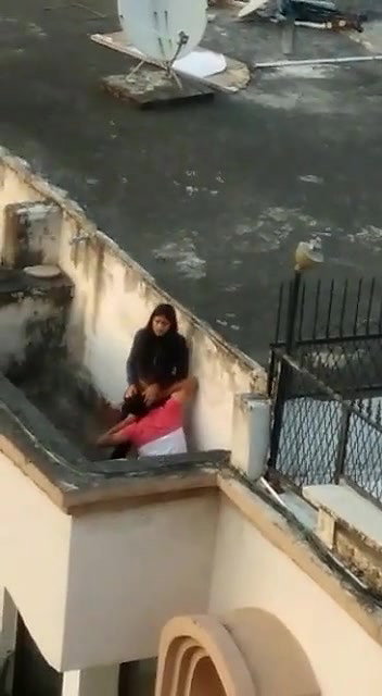 Young lover having on roof,captured