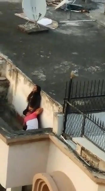 Young lover having on roof,captured