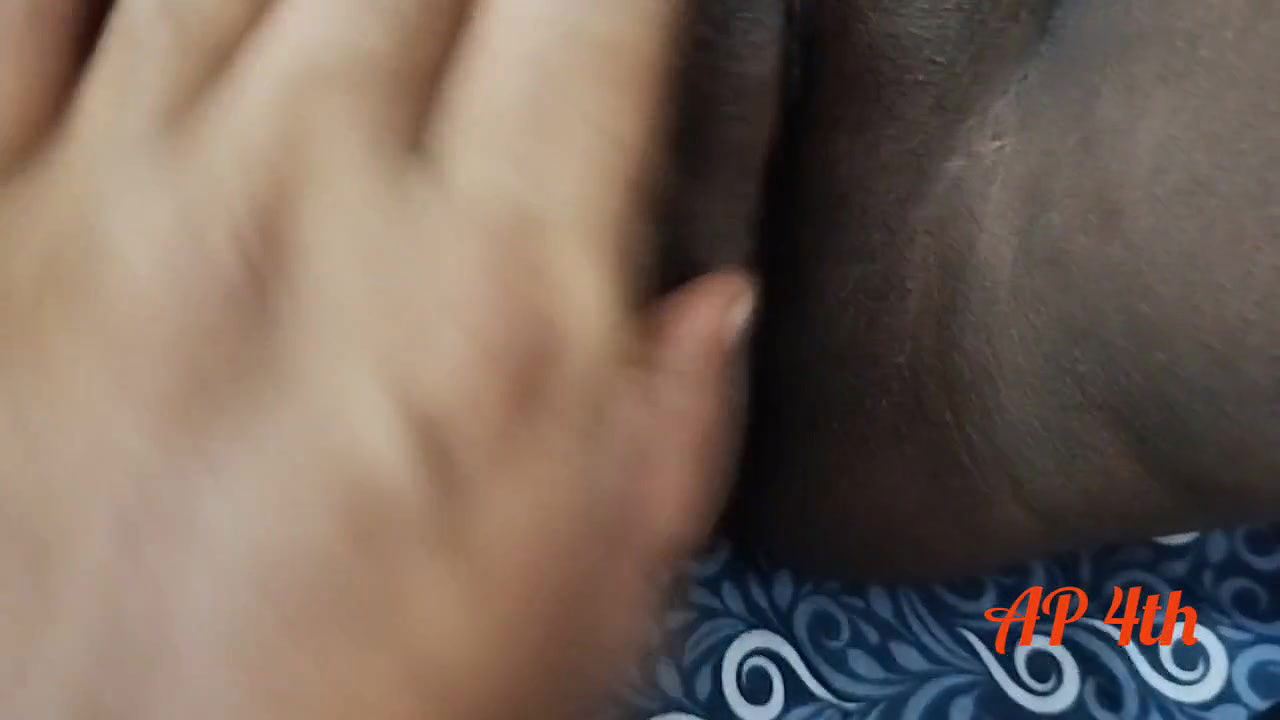 Bengali Bhabhi in saree spreads her leg fingering her pussy