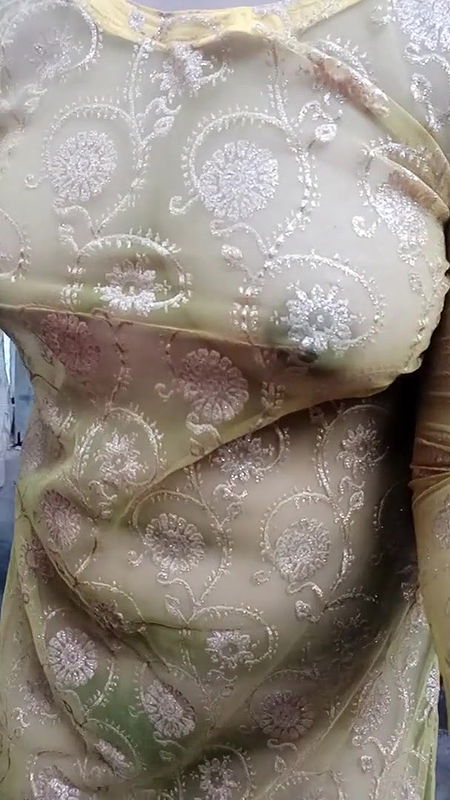 Young girl is bathing in bathroom.