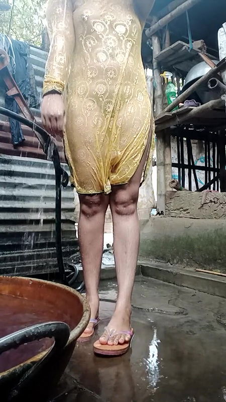 Young girl is bathing in bathroom.