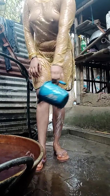 Young girl is bathing in bathroom.