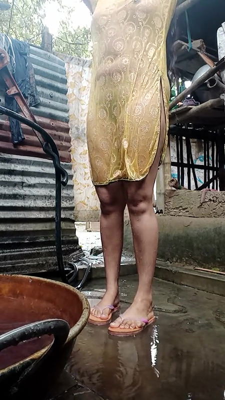 Young girl is bathing in bathroom.