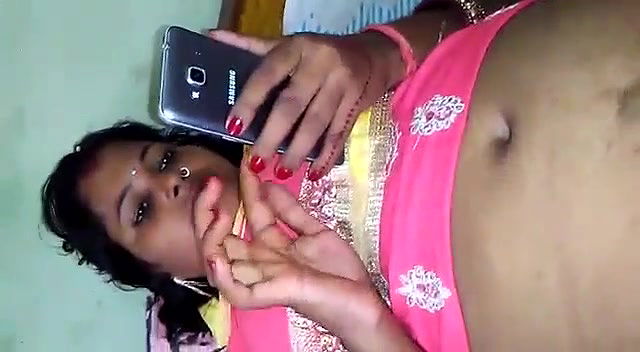 Randi captured while she was busy phone