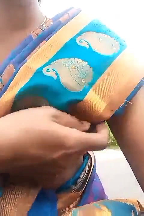 Very beautiful south wife exposing her boobs while going on a bike