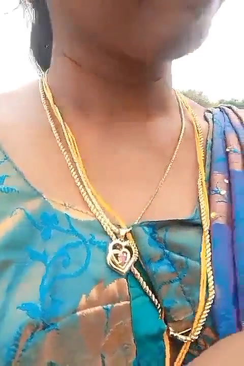 Very beautiful south wife exposing her boobs while going on a bike