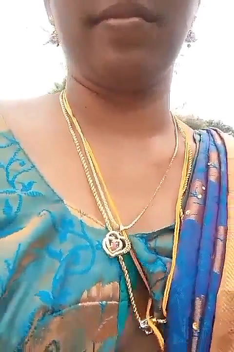 Very beautiful south wife exposing her boobs while going on a bike