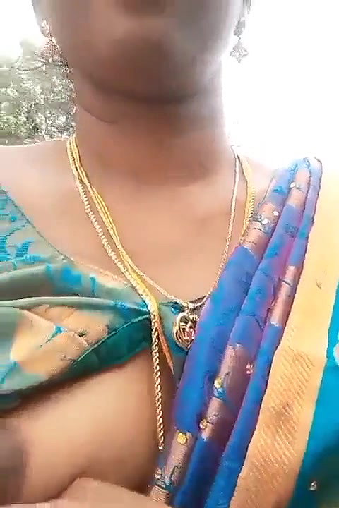 Very beautiful south wife exposing her boobs while going on a bike