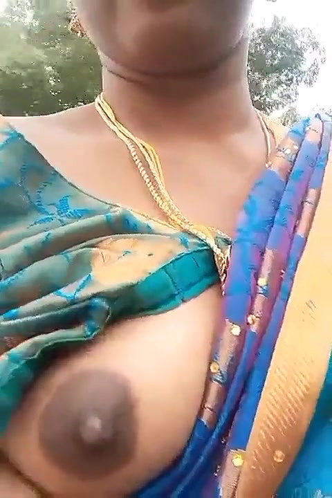Very beautiful south wife exposing her boobs while going on a bike