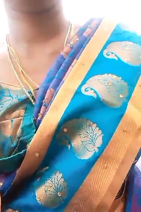 Very beautiful south wife exposing her boobs while going on a bike