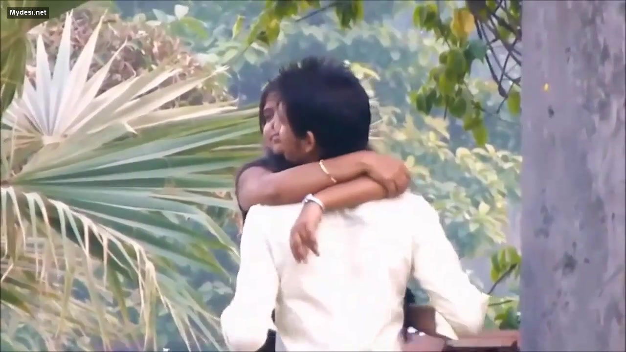 Lovers Smooching in Park