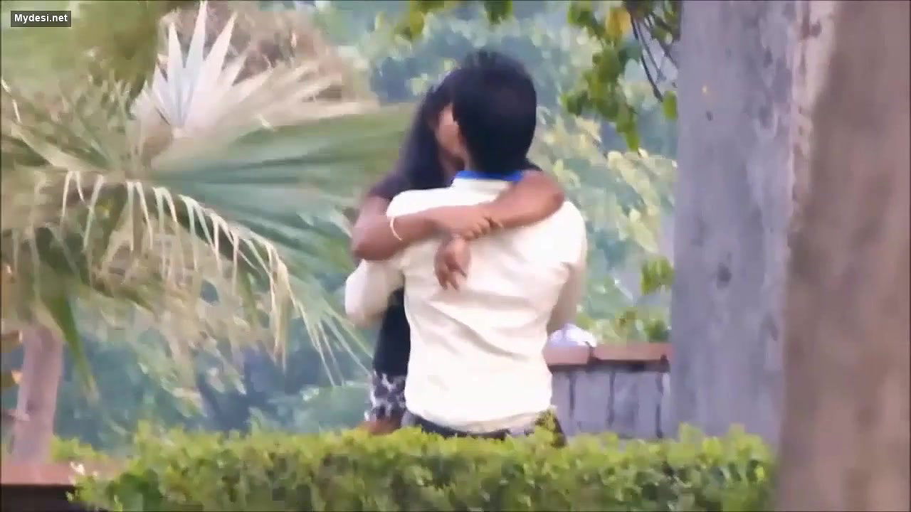 Lovers Smooching in Park