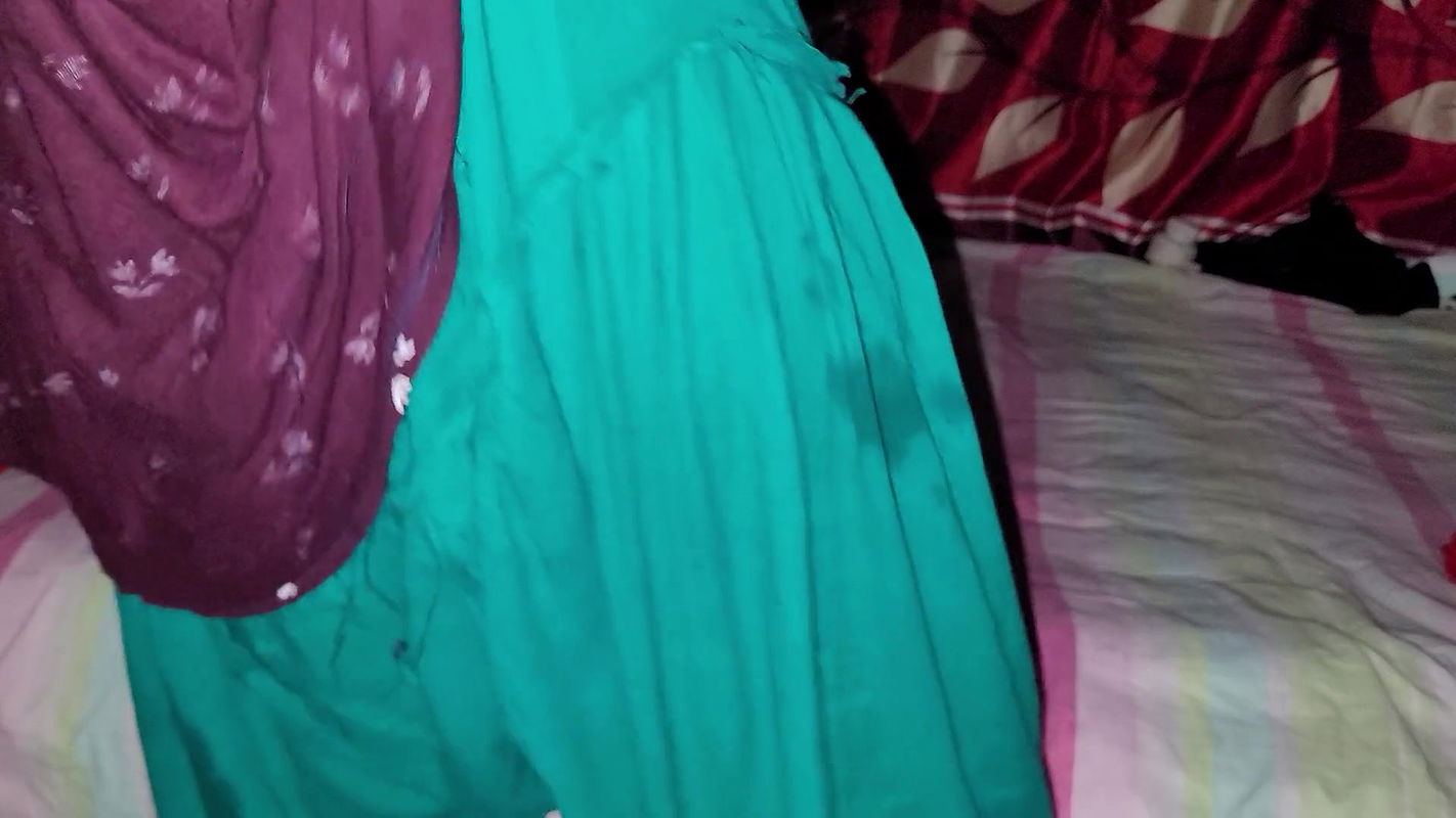 Bangladeshi woman cleaning the house alone