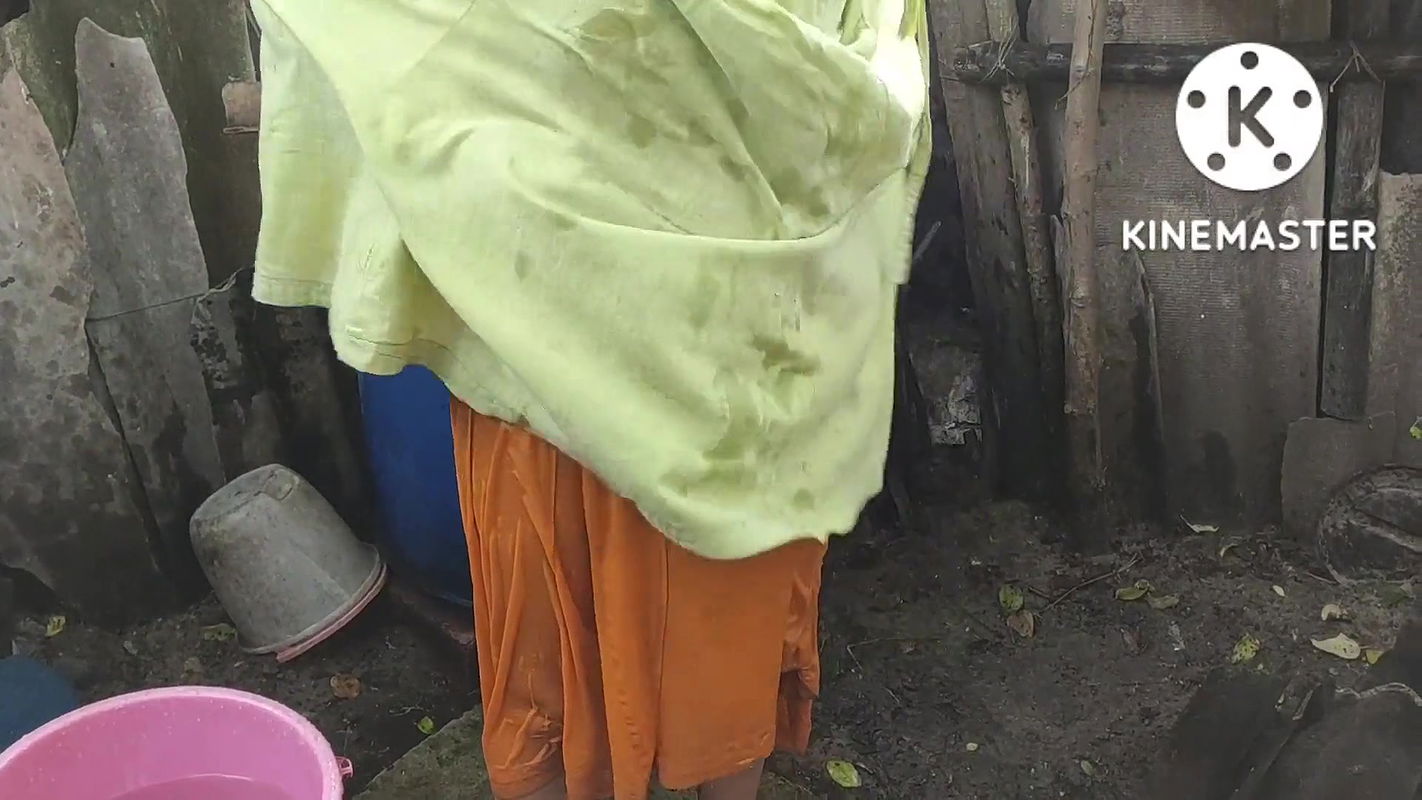 Anita yadav bathing outside with hot