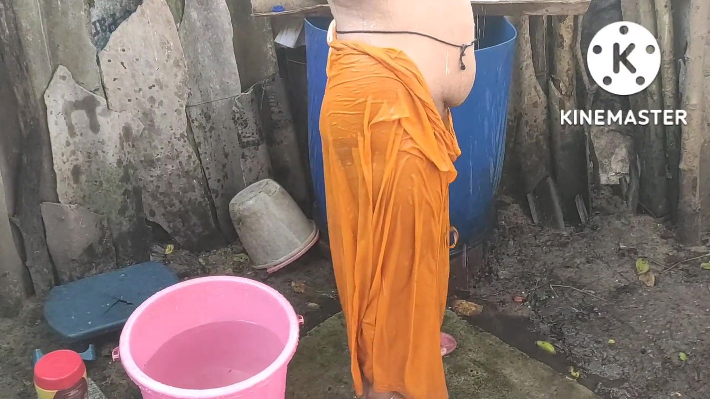 Anita yadav bathing outside with hot