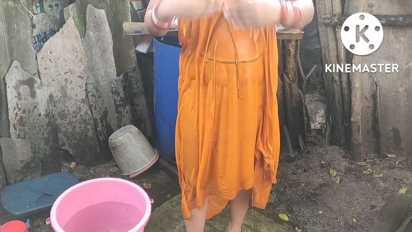 Anita yadav bathing outside with hot