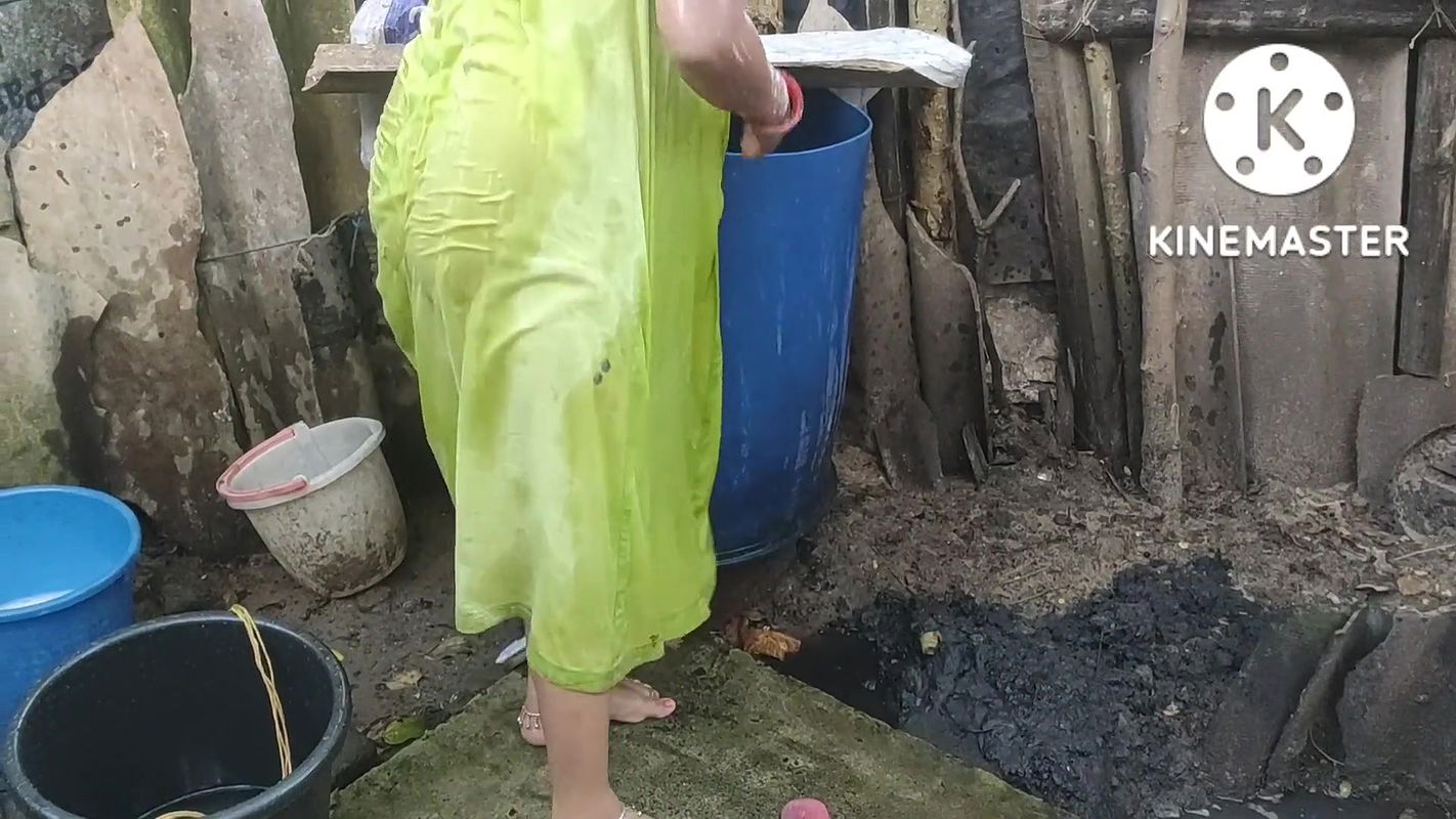 Bathing outside of topless boobs