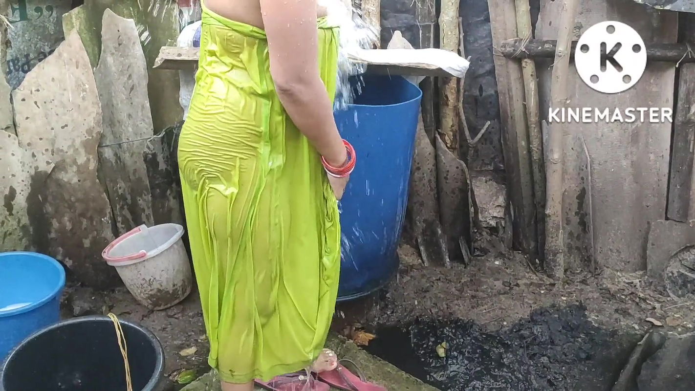 Bathing outside of topless boobs