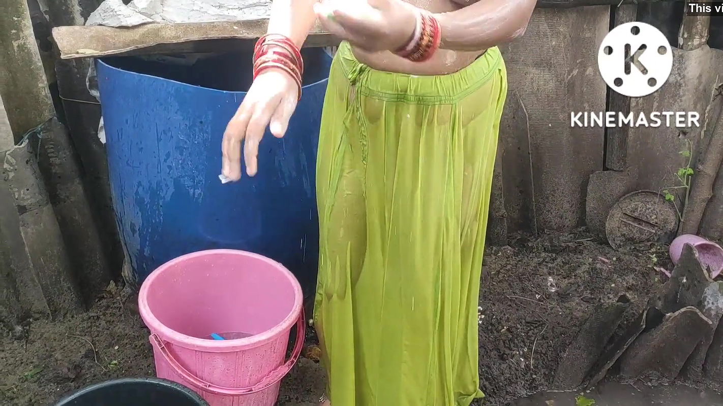 Indian house wife bathing anita style