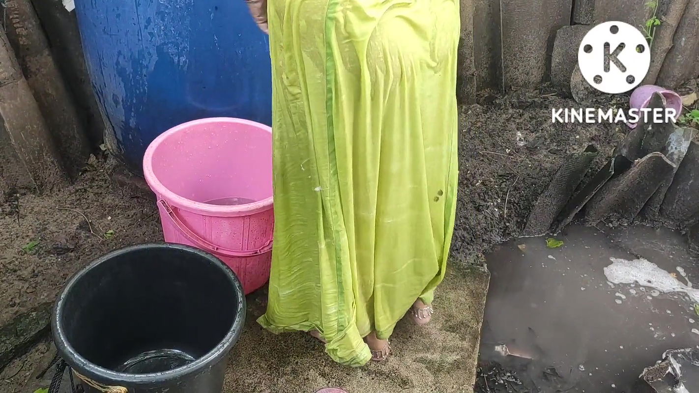 Indian house wife bathing anita style