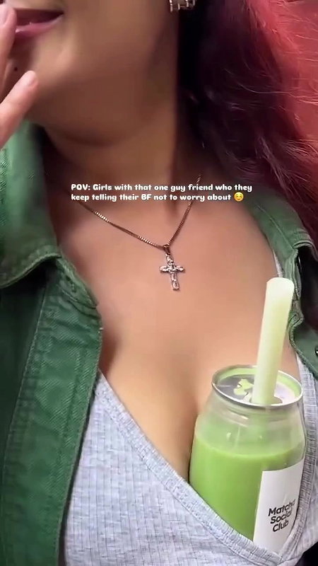 Sexy girl boobs enjoyed by boyfriend drinking juice