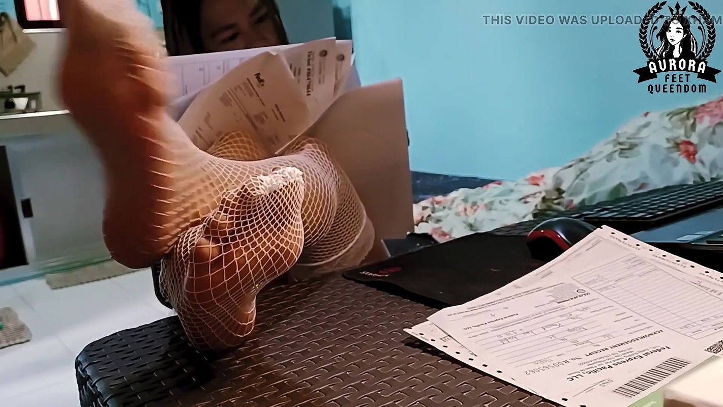 Feet in Fishnet Stockings