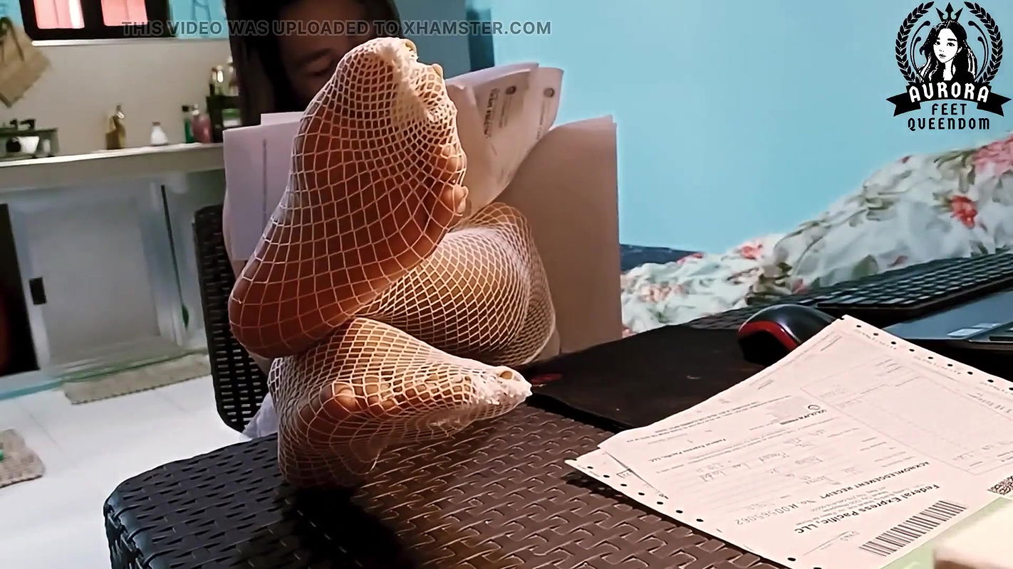 Feet in Fishnet Stockings