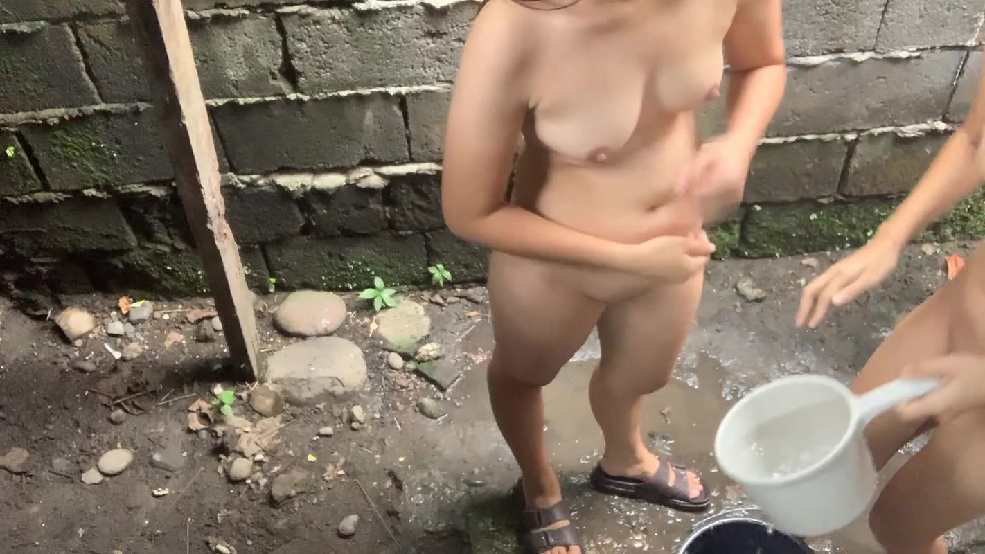 Taking a bath outside our house