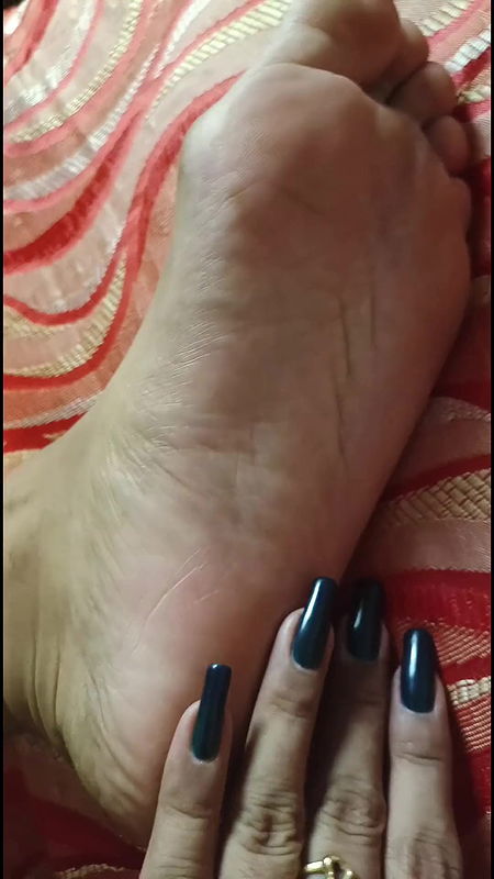 long nails Of mistress and sexy feet