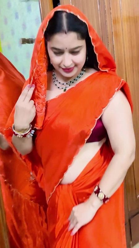 homely desi lady deep navel in orange saree
