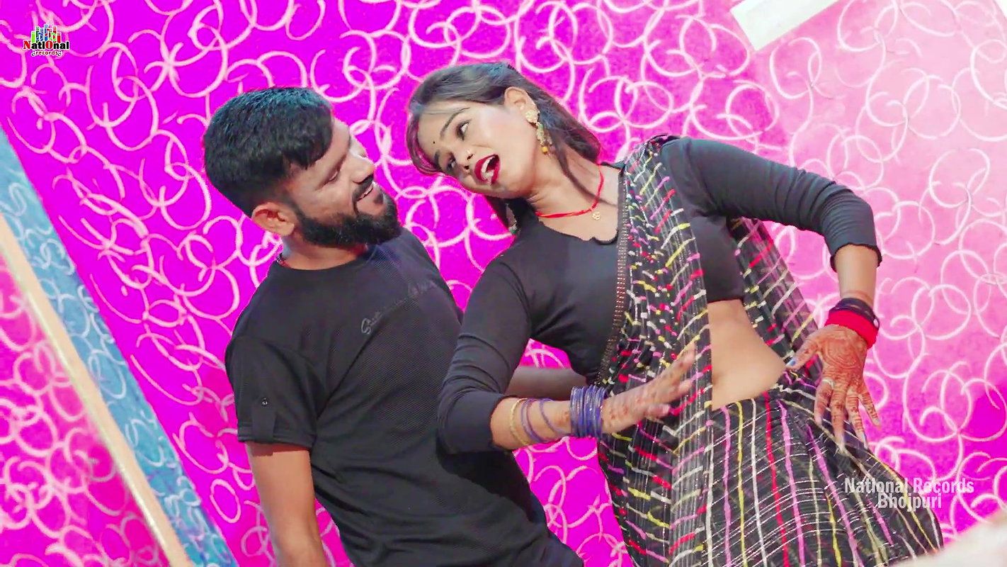 Puja Sharma hot saree song – Deep Navel caressed2