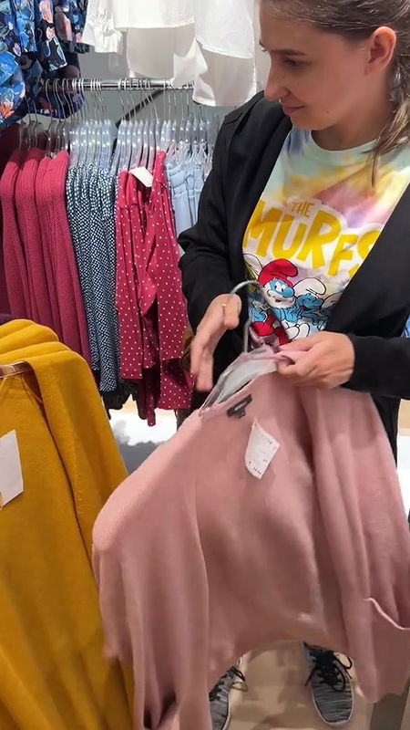 Stripping completely naked in public store