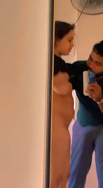 Cute lover enjoying boobs sucking mirror selfie