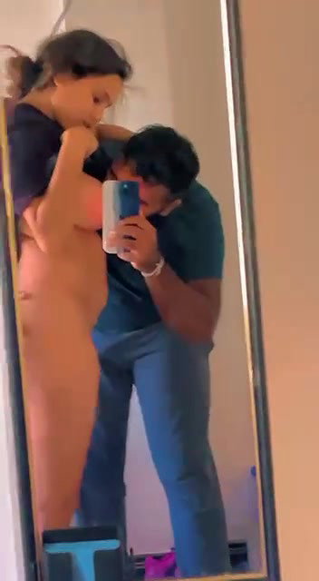 Cute lover enjoying boobs sucking mirror selfie
