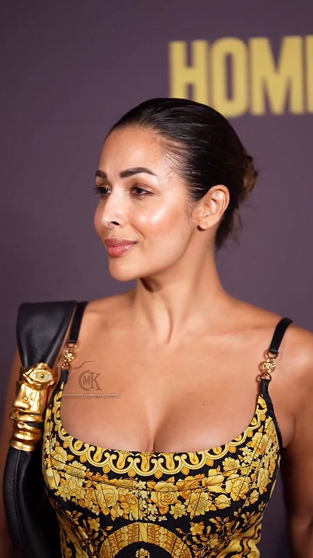 MOMMY MILF MALAIKA ARORA HUGE BOOB CLEAVAGE TEMPTING VIEW 2