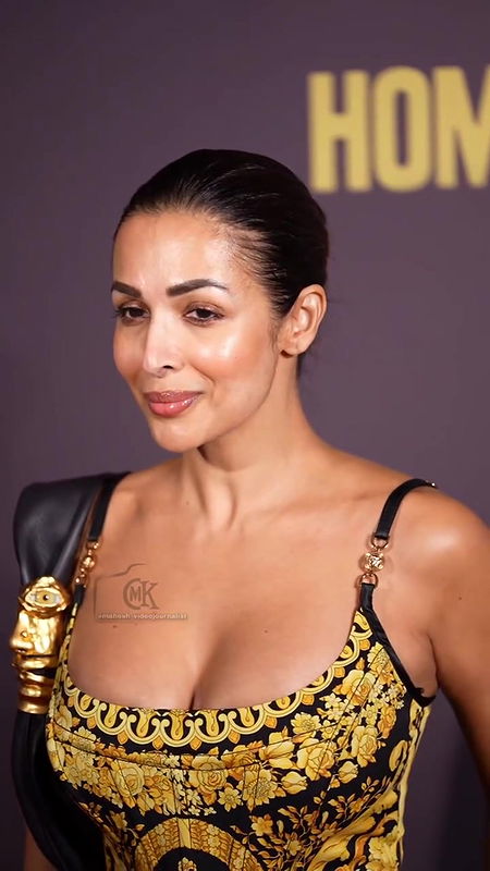 MOMMY MILF MALAIKA ARORA HUGE BOOB CLEAVAGE TEMPTING VIEW 2