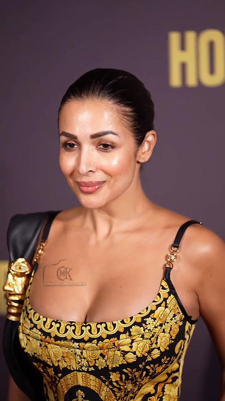 MOMMY MILF MALAIKA ARORA HUGE BOOB CLEAVAGE TEMPTING VIEW 2