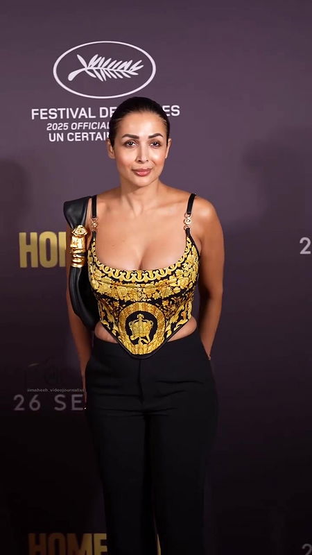 MOMMY MILF MALAIKA ARORA HUGE BOOB CLEAVAGE TEMPTING VIEW 4