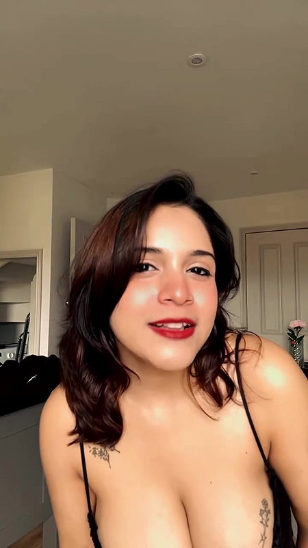 desi nri girl huge breats and cleavge in black costume  2