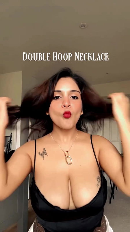 desi nri girl huge breats and cleavge in black costume  2